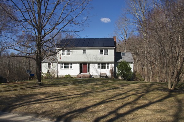 a sign board with parking space