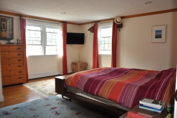 18 Riga Road Dover, MA 02030 - Photo 11 of 24 a bedroom with a bed and wooden floor