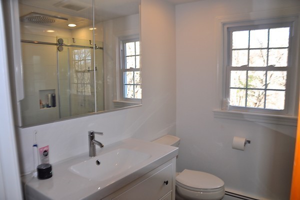 18 Riga Road Dover, MA 02030 - Photo 14 of 24 a bathroom with a sink a toilet and shower