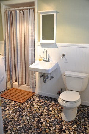 18 Riga Road Dover, MA 02030 - Photo 17 of 24 a bathroom with a sink and a toilet
