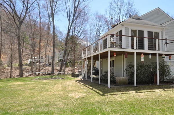 18 Riga Road Dover, MA 02030 - Photo 18 of 24 a view of a house with yard and sitting area