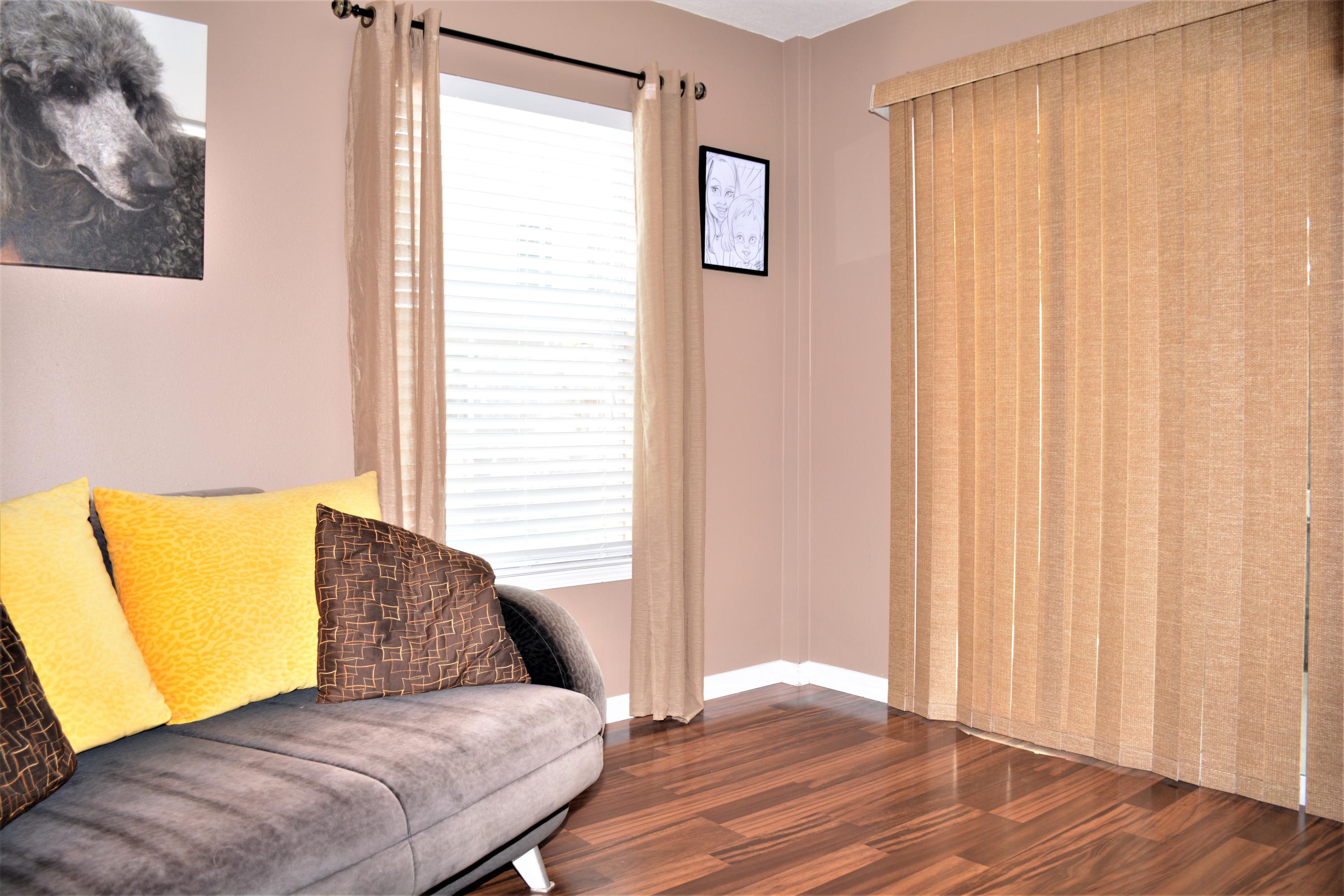 1790 Old Ranch Road Fort Walton Beach, FL 32547 - Photo 22 of 59 a bedroom with a bed and wooden floor