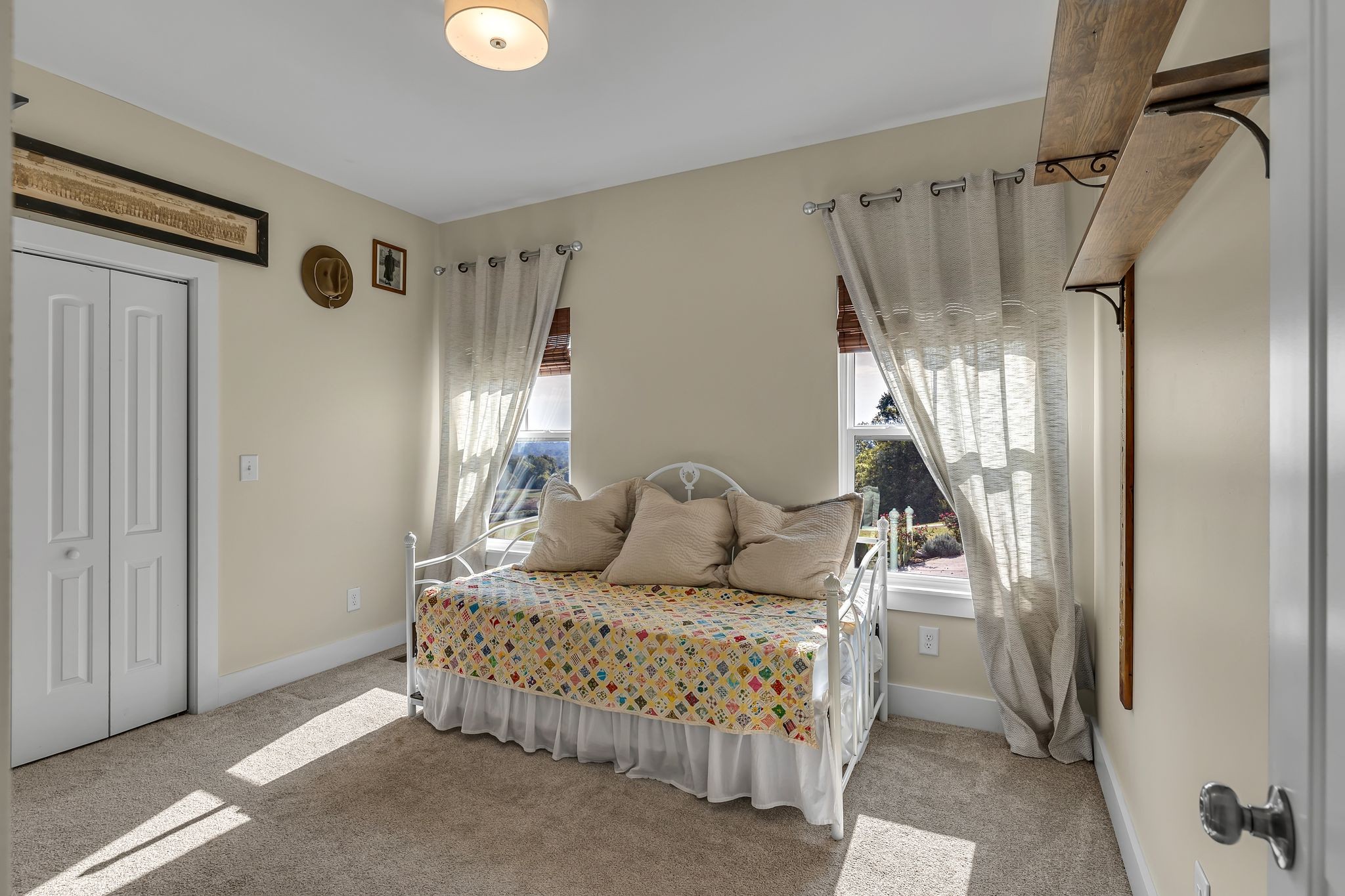 2770 East Sheepneck Road Culleoka, TN 38451 - Photo 15 of 49 a bedroom with a bed and a mirror