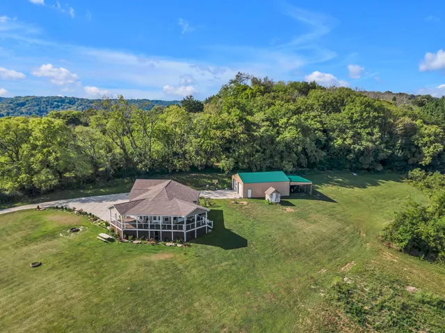 a view of a garden with a lake