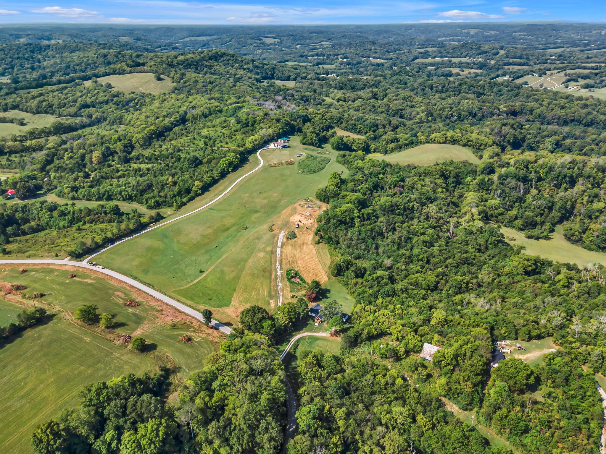 2770 East Sheepneck Road Culleoka, TN 38451 - Photo 36 of 49 an aerial view of residential houses with outdoor space and trees