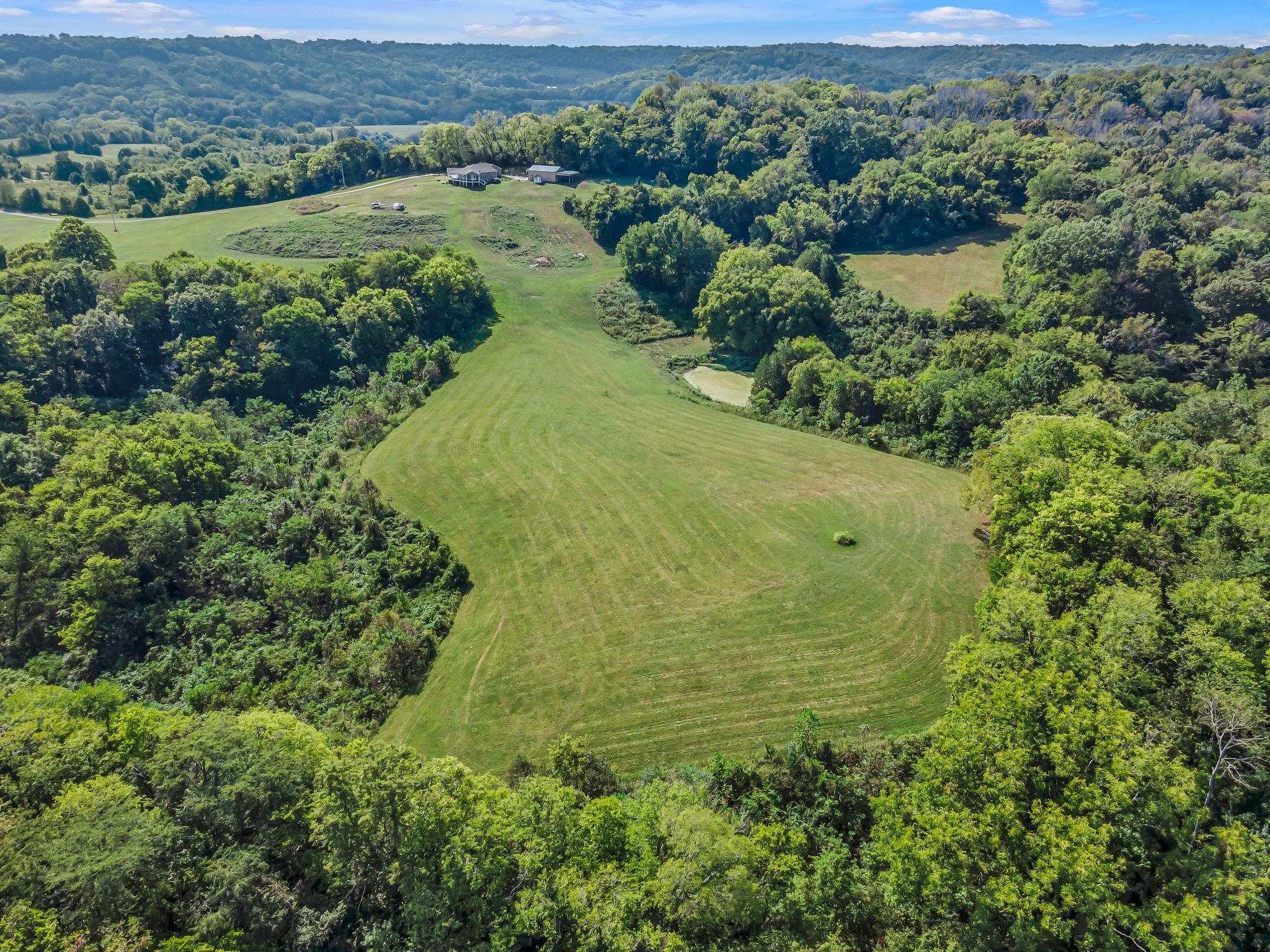 2770 East Sheepneck Road Culleoka, TN 38451 - Photo 38 of 49 an aerial view of residential houses with outdoor space and trees
