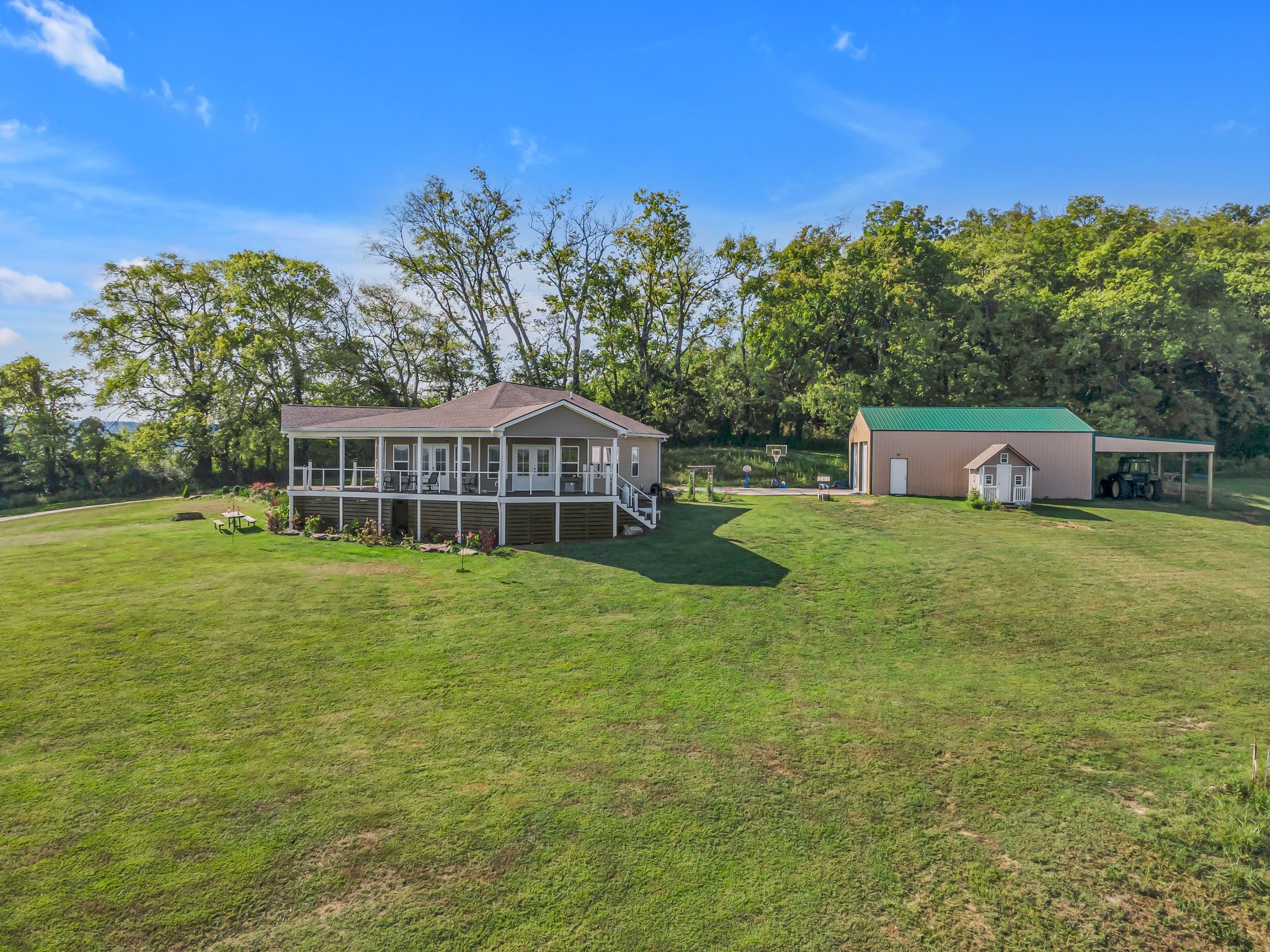 2770 East Sheepneck Road Culleoka, TN 38451 - Photo 39 of 49 a front view of a house with garden
