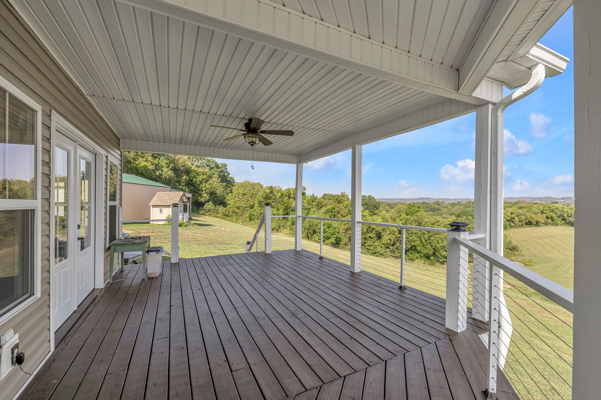 2770 East Sheepneck Road Culleoka, TN 38451 - Photo 41 of 49 a view of porch with wooden floor