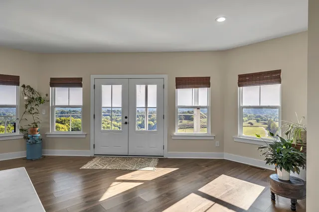 a kitchen with stainless steel appliances a refrigerator stove and microwave