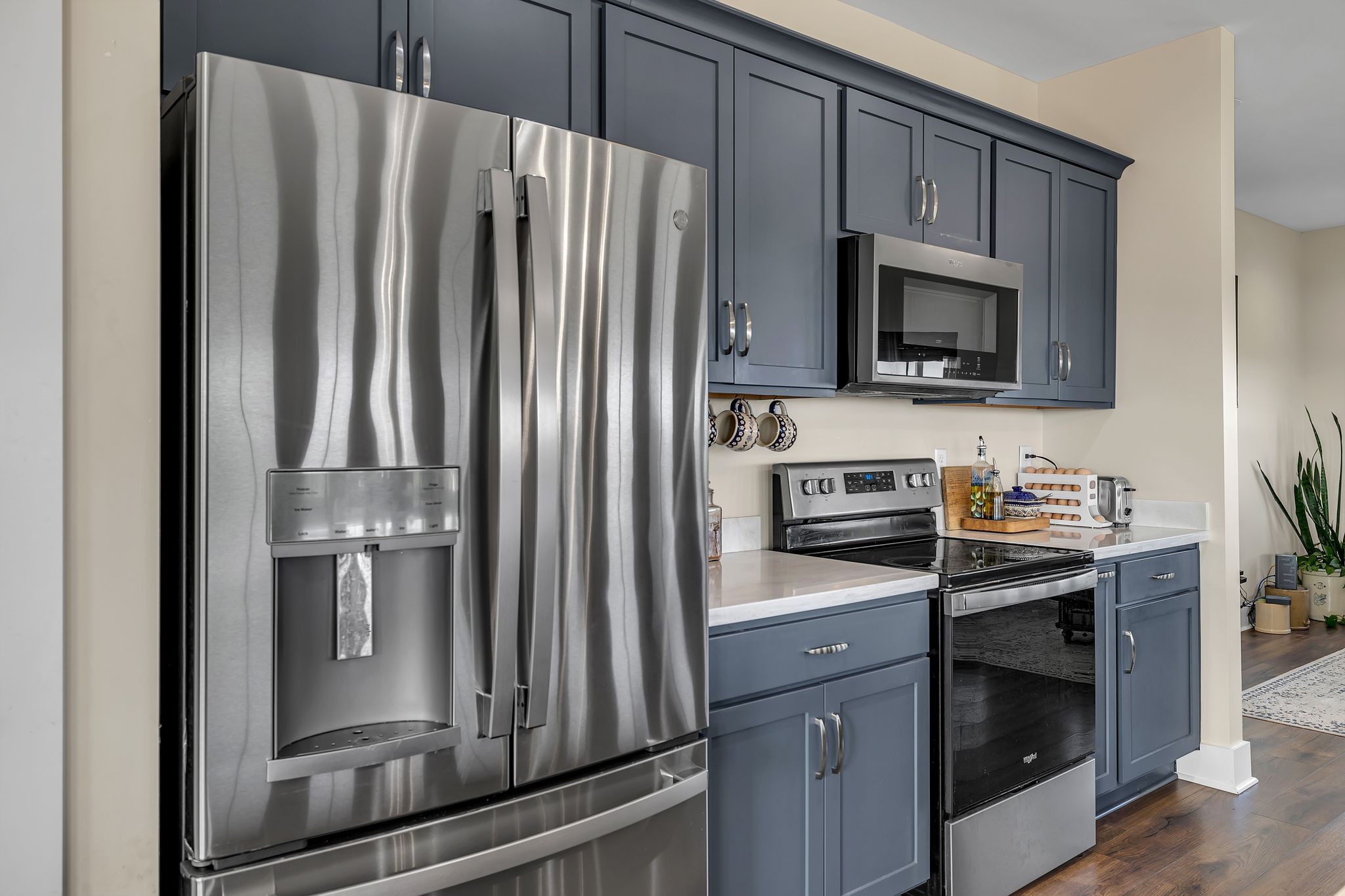2770 East Sheepneck Road Culleoka, TN 38451 - Photo 45 of 49 a kitchen with stainless steel appliances a refrigerator stove and microwave