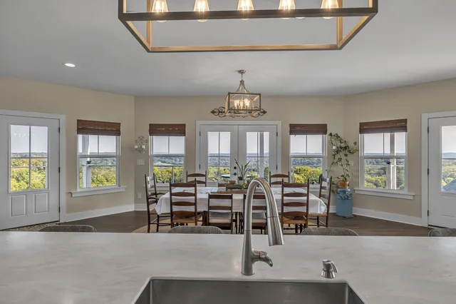a view of a livingroom with furniture window and outside view