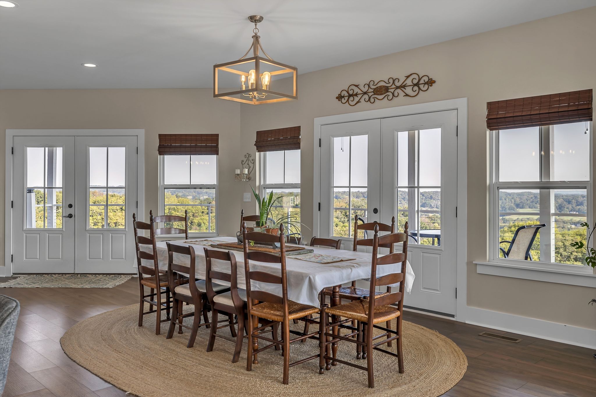 2770 East Sheepneck Road Culleoka, TN 38451 - Photo 9 of 49 a view of a dining room with furniture window and wooden floor