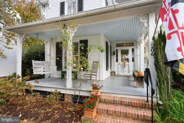a view of a chairs and table in the patio