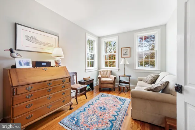 a view of a livingroom with furniture and window