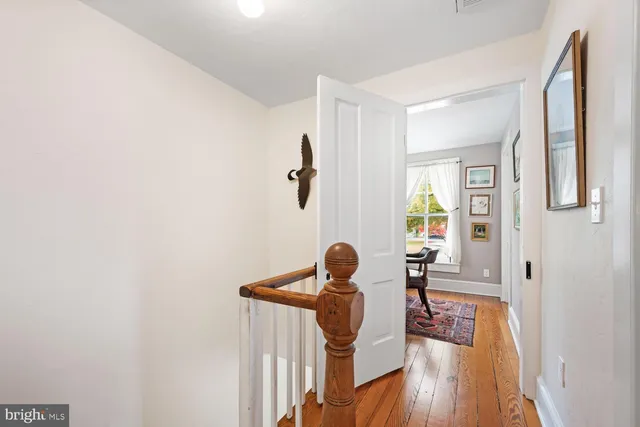 a bed room with a bed and a window