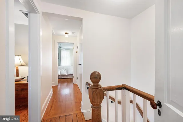 a view of a storage and utility room with washer and dryer