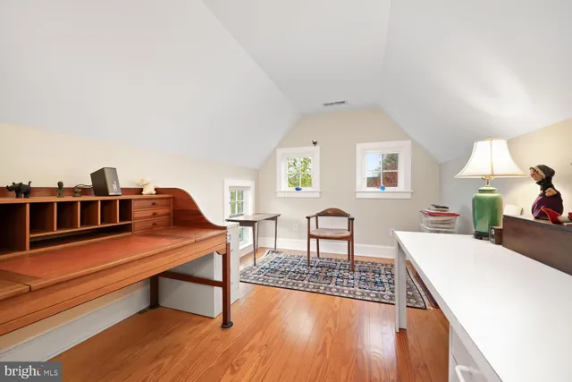 a view of swimming pool with a table and chairs