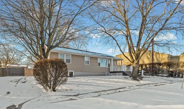 a view of a house with a snow covered with snow