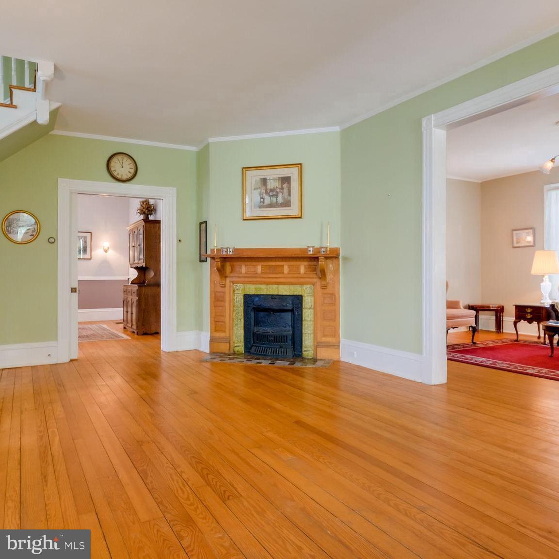 130 Woodland Road Wyncote, PA 19095 - Photo 7 of 37 AUTHENTIC tile and wood framed fireplace