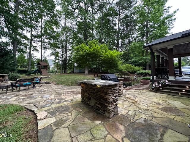 1905 Topsfield Court Raleigh, NC 27615 - Photo 11 of 45 a view of backyard with swimming pool and sitting area