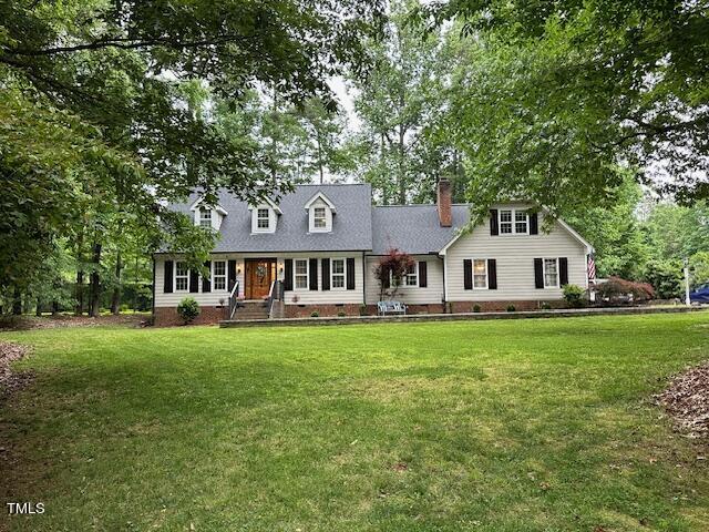 1905 Topsfield Court Raleigh, NC 27615 - Photo 3 of 45 a front view of a house with garden