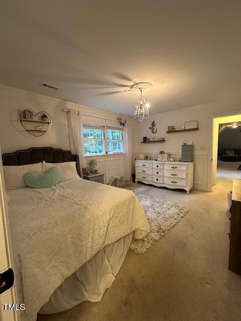 1905 Topsfield Court Raleigh, NC 27615 - Photo 35 of 45 a bedroom with a bed and dresser