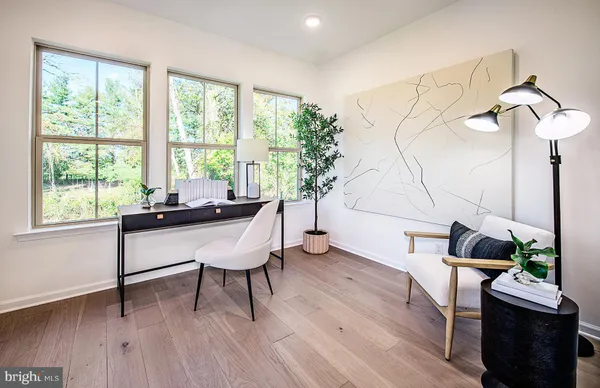 a room with furniture and a window