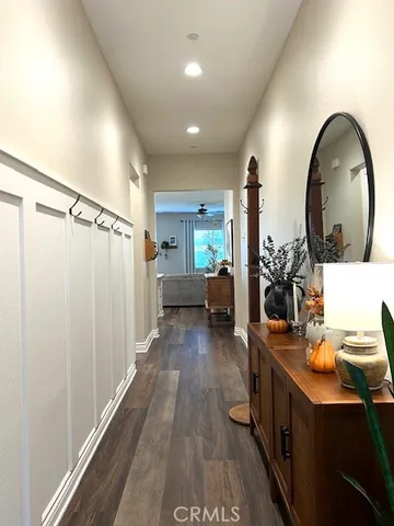 a bathroom with a sink mirror and a shower