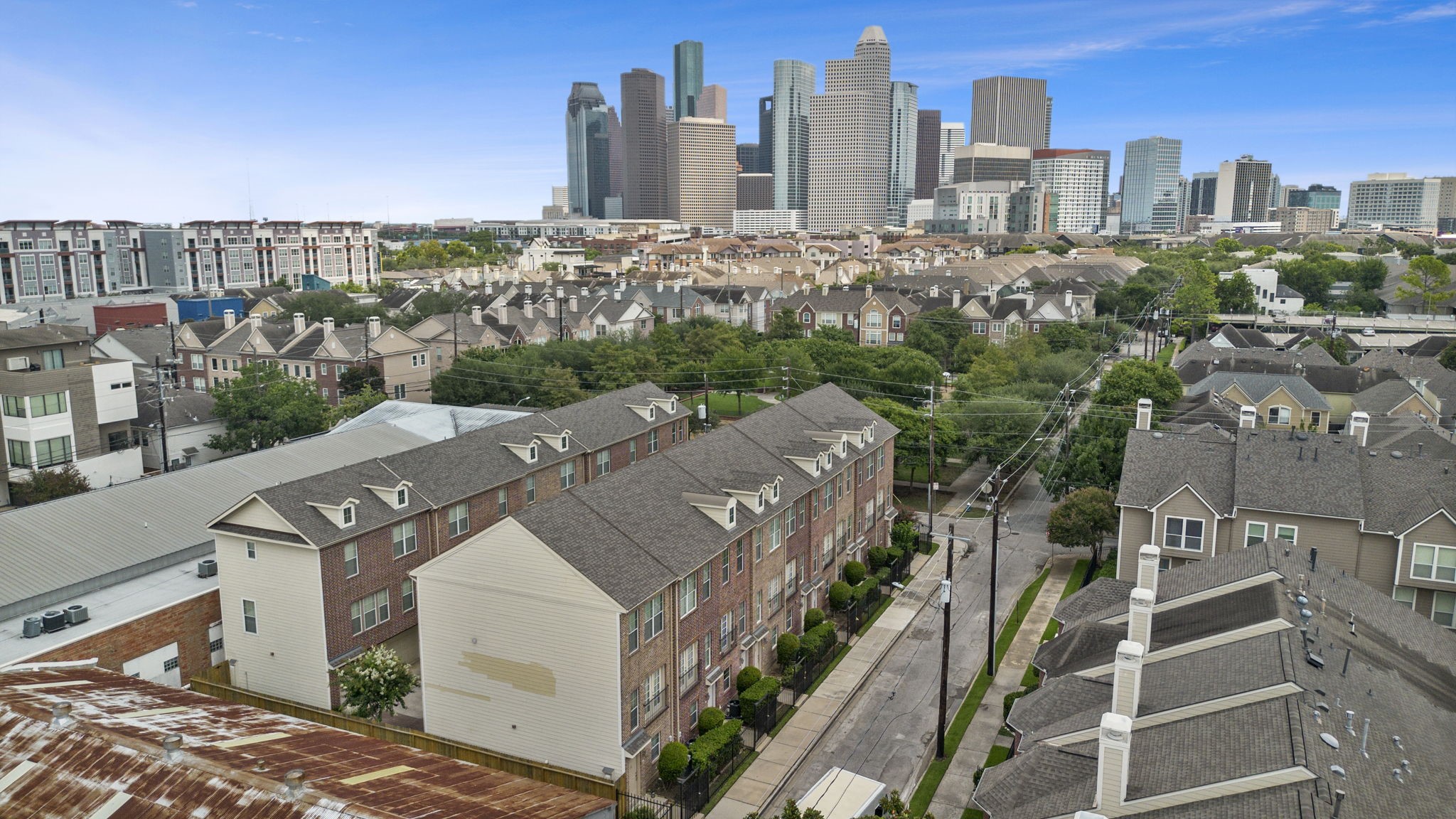 1913 Gillette Street, Unit C Houston, TX 77006 - Photo 21 of 23 a view of a city with tall buildings