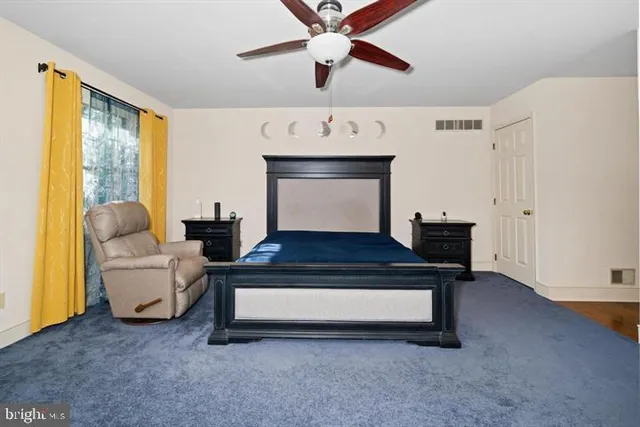 a view of a balcony with wooden floor