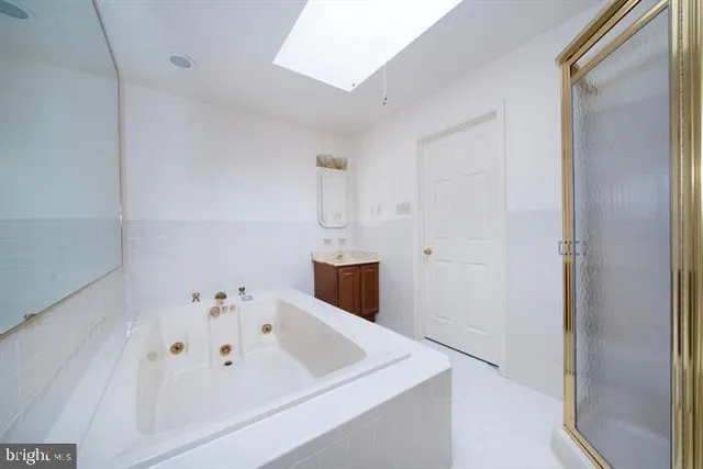 a bed room with a bed and a chair