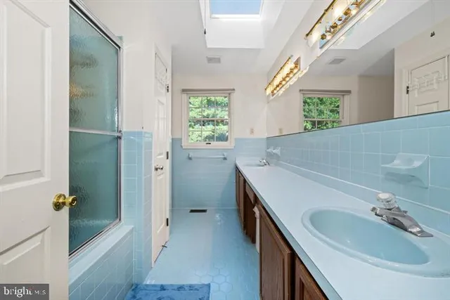 a front view of a house with parking space