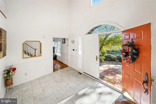 a living room with furniture a fireplace and a fireplace