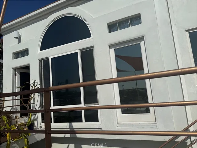 a view of a balcony with lake view