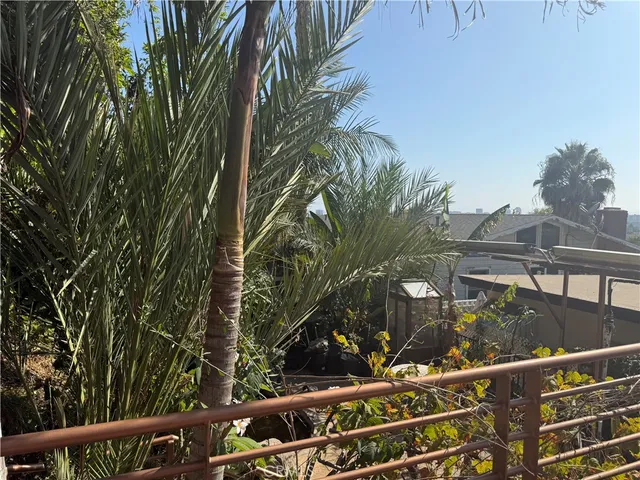 a view of a house with a street