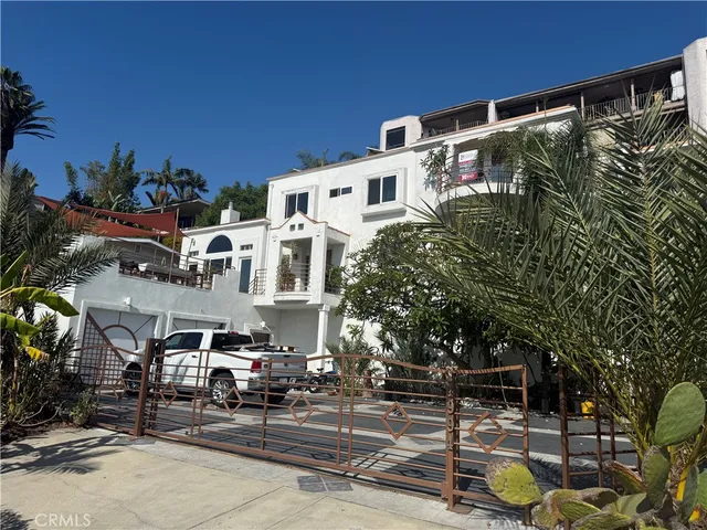 a view of a livingroom with furniture and a window