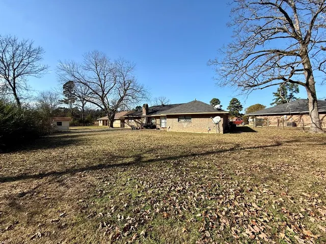 a view of street with parked cars