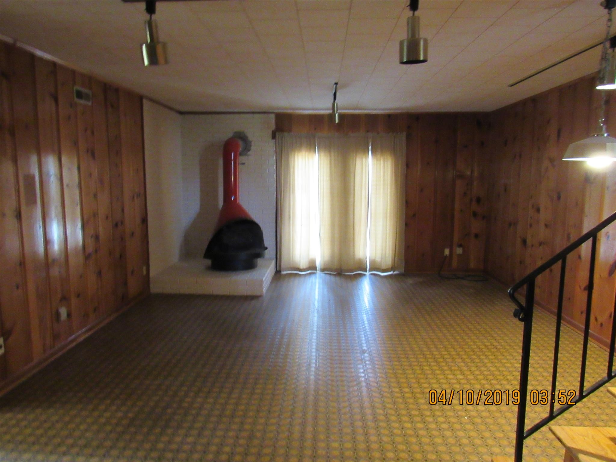 244 Pine Thicket Road McEwen, TN 37101 - Photo 17 of 26 a hallway with wooden floor chandelier and entryway
