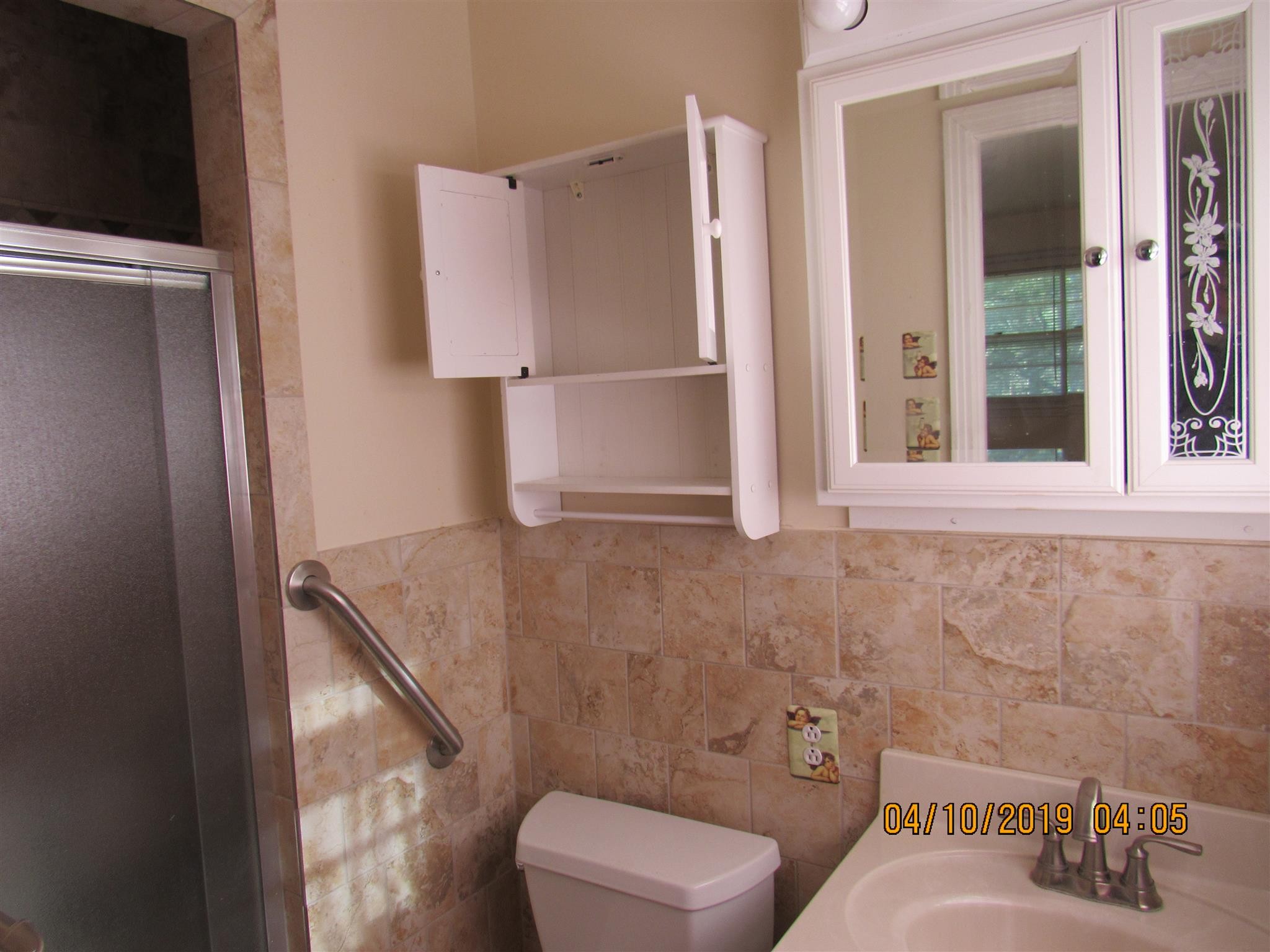 244 Pine Thicket Road McEwen, TN 37101 - Photo 25 of 26 a bathroom with a toilet and a sink