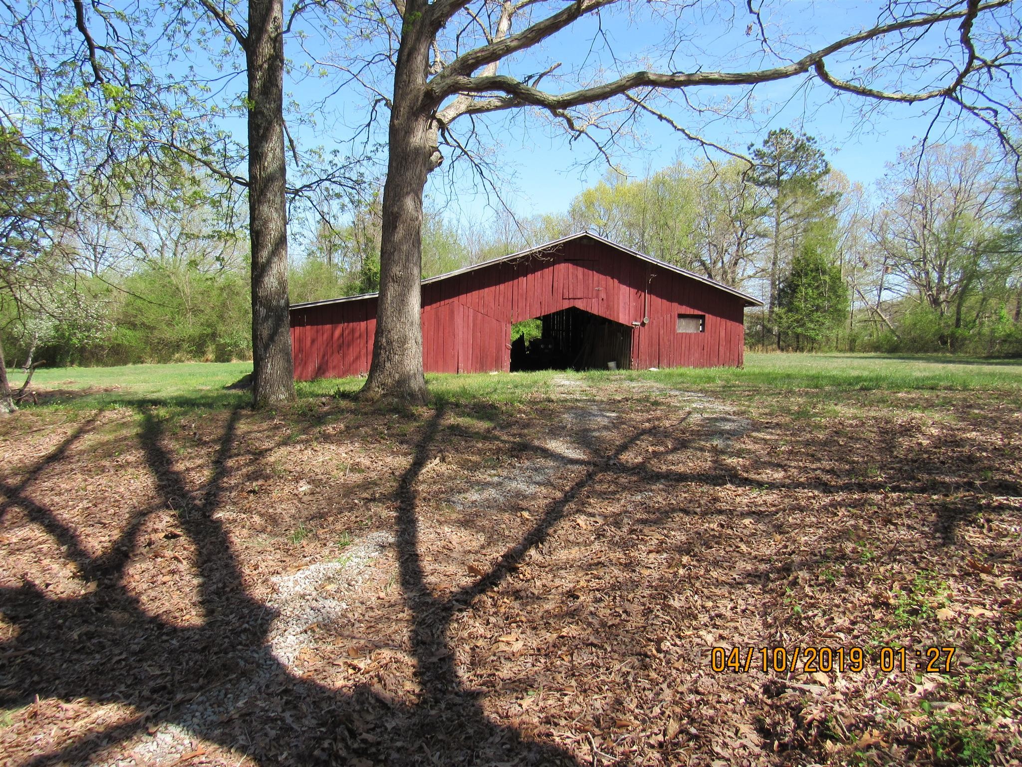 244 Pine Thicket Road McEwen, TN 37101 - Photo 7 of 26 a front view of a house with a yard
