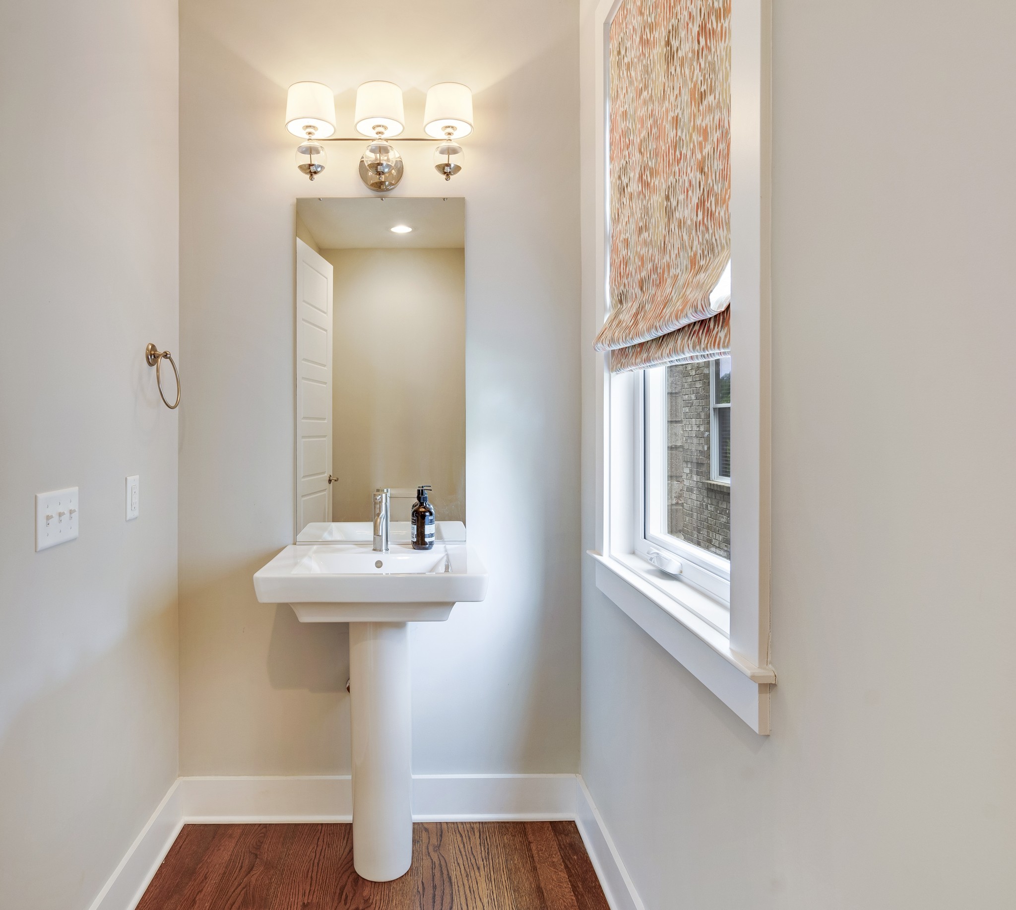 119 Demoss Road Nashville, TN 37209 - Photo 8 of 49 a bathroom with a sink a mirror and shower