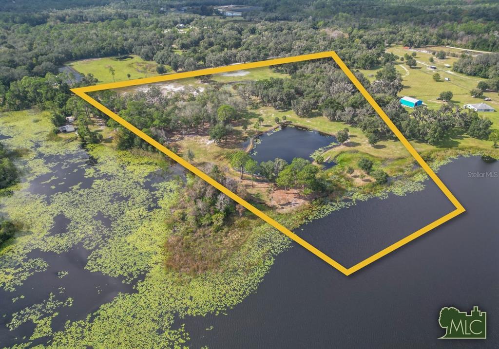 1499 Murphy Road Pierson, FL 32180 - Photo 4 of 4 a view of a small pool with a backyard