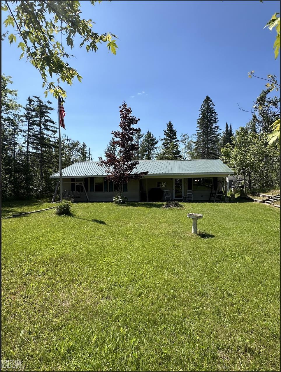 16865 Grace Harbor Road Millersburg, MI 49759 - Photo 2 of 35