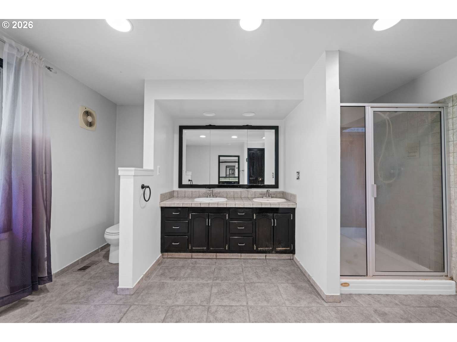 33887 Church Road Warren, OR 97053 - Photo 27 of 35 a living room with a sink and a mirror