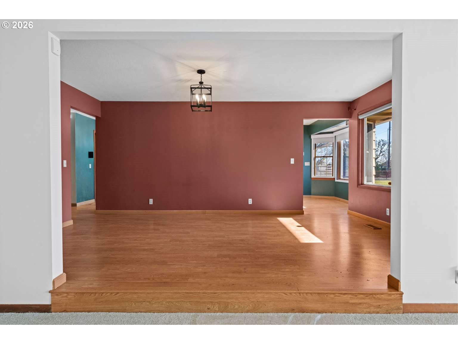 33887 Church Road Warren, OR 97053 - Photo 10 of 35 a view of livingroom with hardwood floor and kitchen