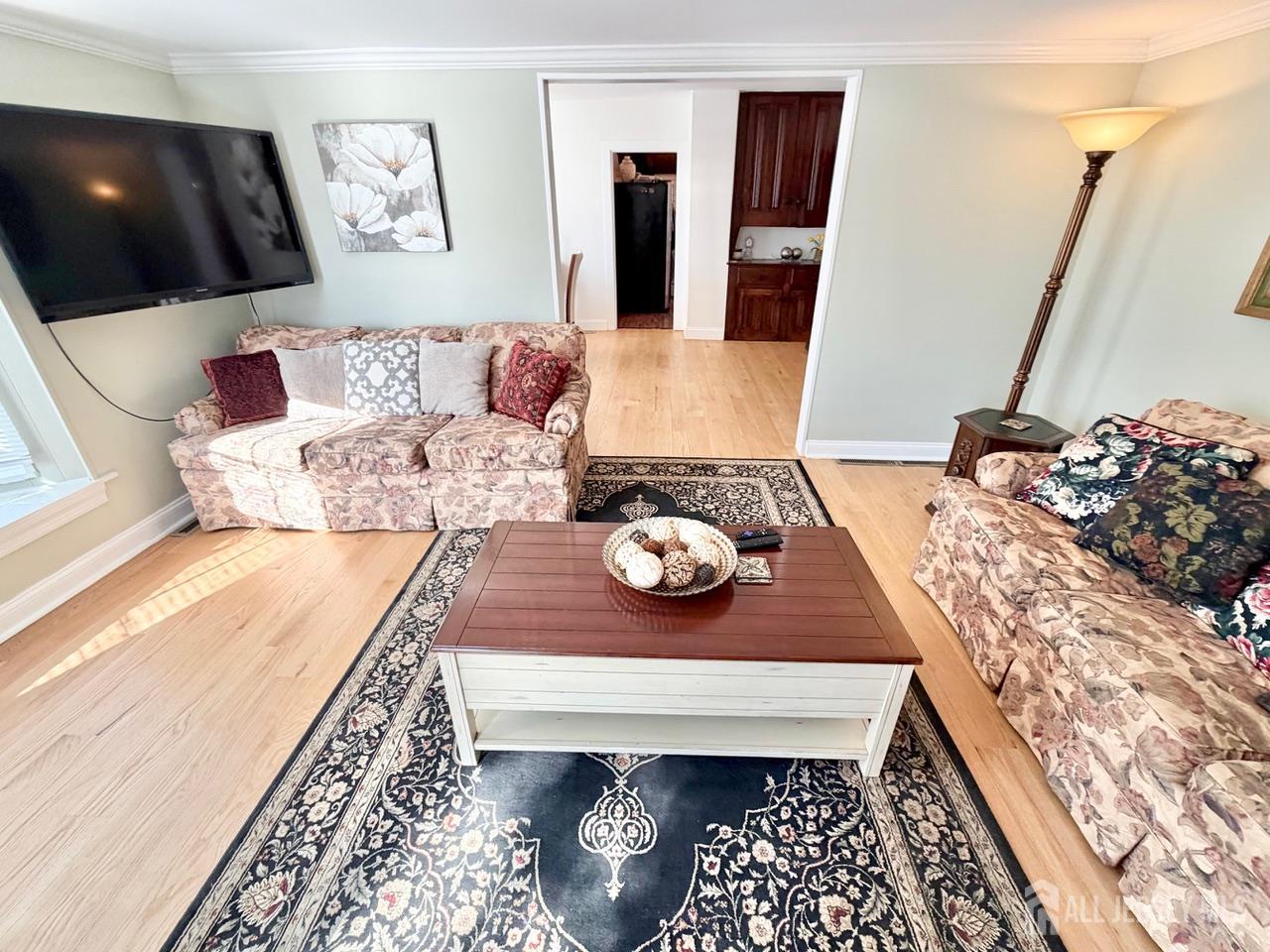 623-623 Main Street Leesburg, NJ 08327 - Photo 15 of 66 a living room with furniture and flat screen tv