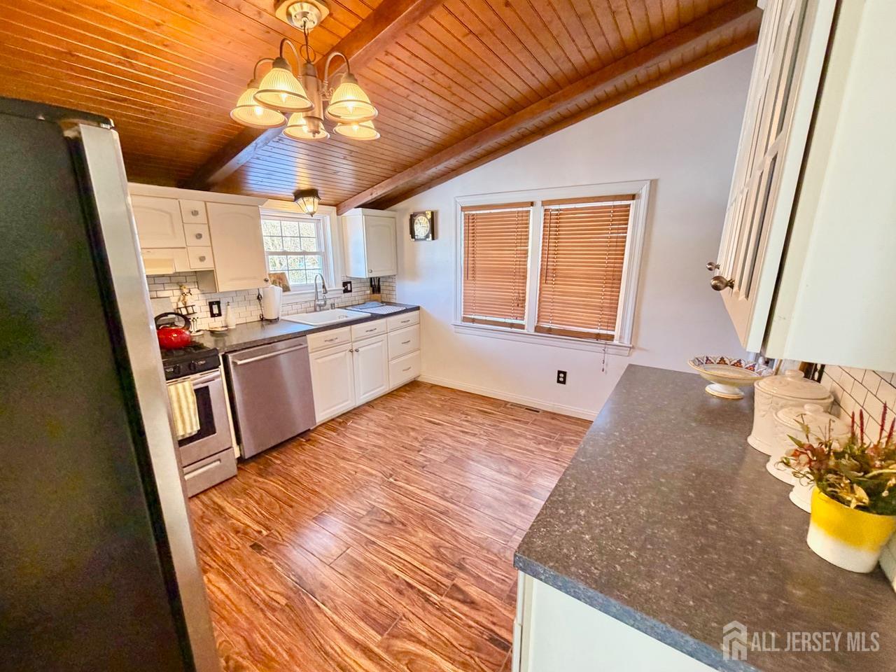623-623 Main Street Leesburg, NJ 08327 - Photo 25 of 66 a view of a kitchen with a sink and a window
