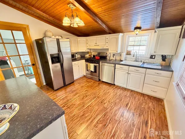 a bed room with a bed and a window