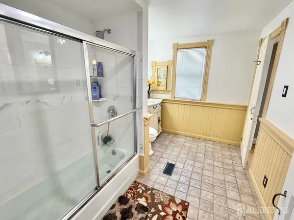 a living room with a couch and a table