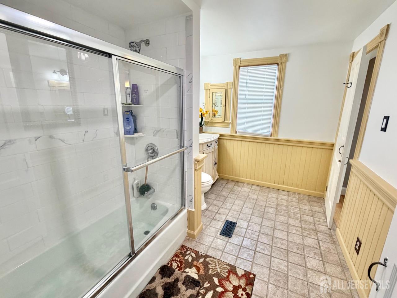 623-623 Main Street Leesburg, NJ 08327 - Photo 47 of 66 a bathroom with a glass door shower